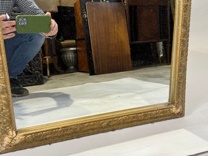 Rectangular wood and gilded stucco mirror...