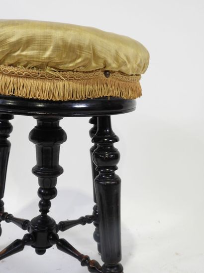 Blackened wood stool, turned, tapered and...