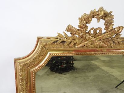 Rectangular wood and gilded stucco mirror...