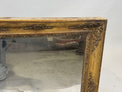 Rectangular wood and gilded stucco mirror...