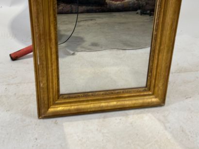 Rectangular mirror in wood and gilded stucco....