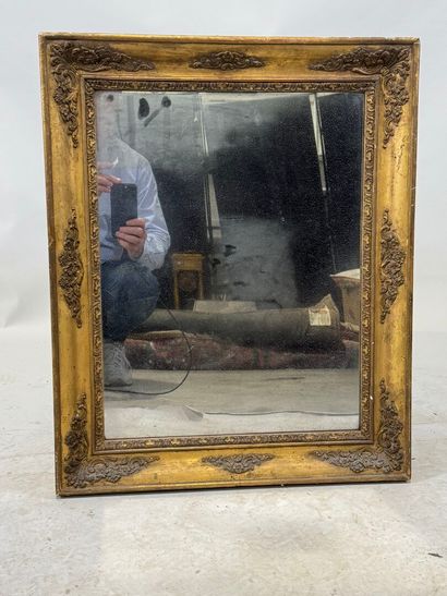Rectangular wood and gilded stucco mirror...