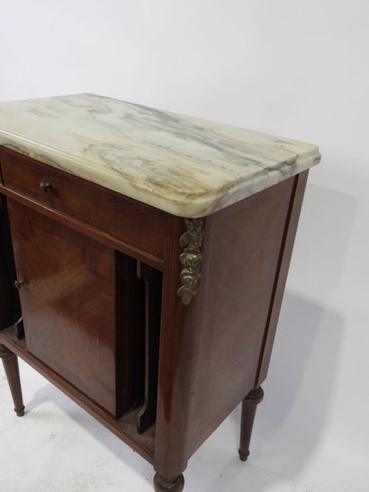 Wooden and veneered bedside cabinet opening...