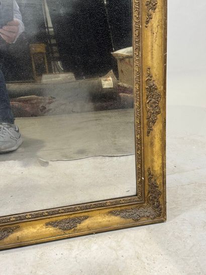 Rectangular wood and gilded stucco mirror...
