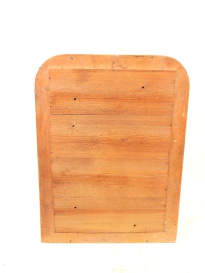 Wood and gilded stucco mirror, with rounded...