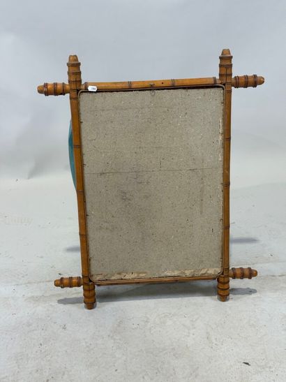 Rectangular bamboo-framed mirror. 
69 x 56...