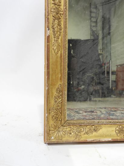 Rectangular wood and gilded stucco mirror...