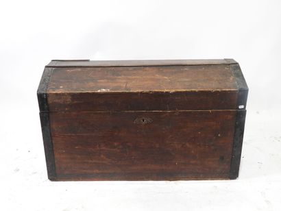Patinated wood trunk with blackened iron...