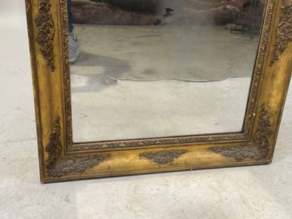 Rectangular wood and gilded stucco mirror...