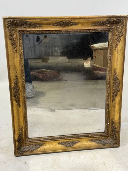 Rectangular wood and gilded stucco mirror...