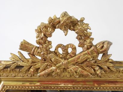 Rectangular wood and gilded stucco mirror...