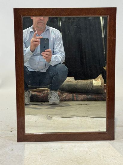 Rectangular mirror in stained wood. 
60 x...