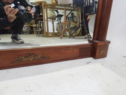 Exotic wood mirror with half-columns topped...