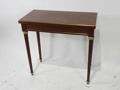 Game table in wood and rosewood veneer, the...