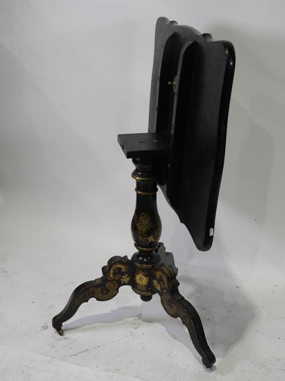 Tripod pedestal table in black lacquered...