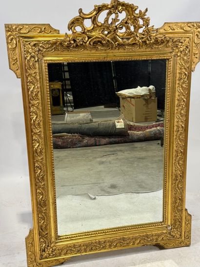 Rectangular wood and stucco mirror with rows...