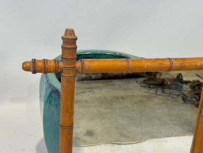 Rectangular bamboo-framed mirror. 
69 x 56...