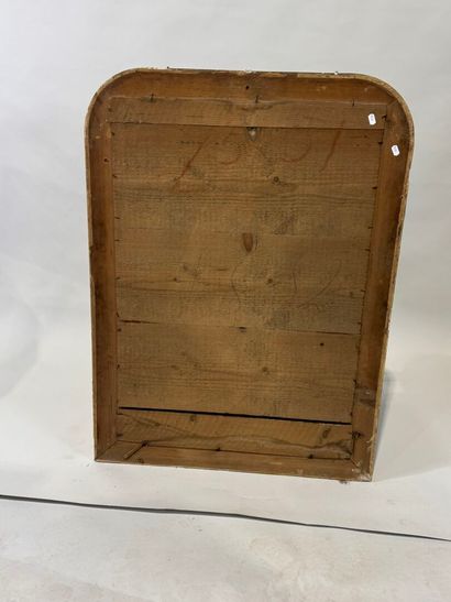 Wood and gilded stucco mirror with rounded...