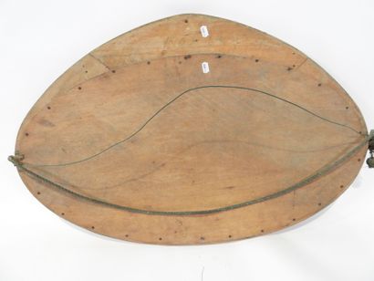 Oval-shaped bevelled mirror in wood and gilded...