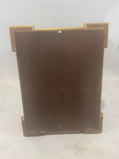 Wood and gilded stucco mirror with protruding...