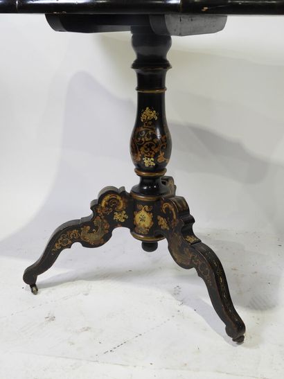 Tripod pedestal table in black lacquered...