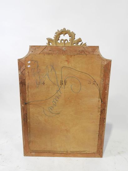 Rectangular wood and gilded stucco mirror...