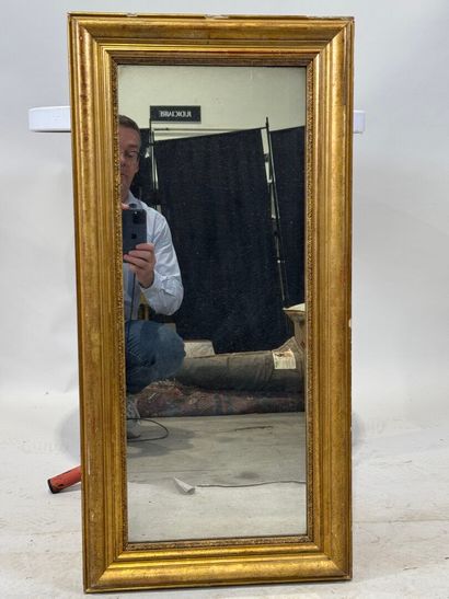 Rectangular mirror in wood and gilded stucco....