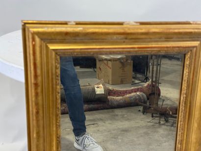 Rectangular mirror in wood and gilded stucco....
