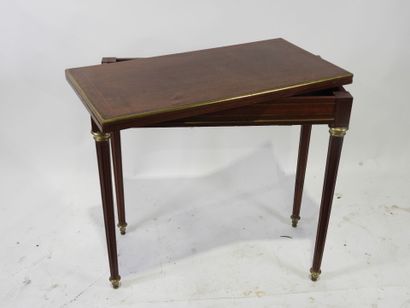 Game table in wood and rosewood veneer, the...