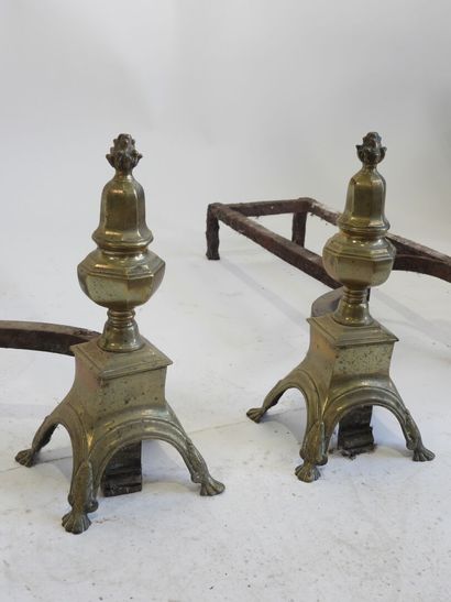 Pair of brass and wrought iron andirons forming...