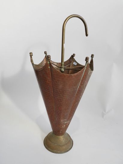 Brass and copper umbrella stand in the shape...