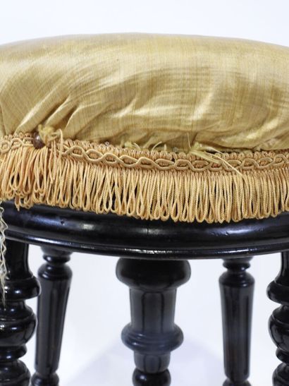 Blackened wood stool, turned, tapered and...