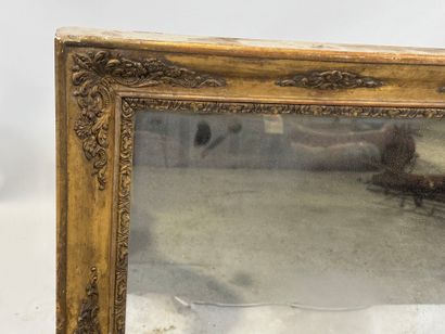 Rectangular wood and gilded stucco mirror...