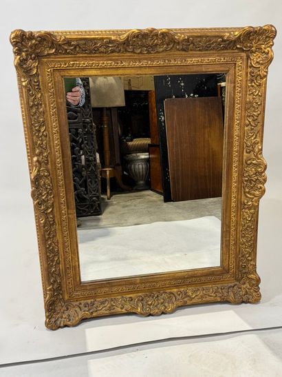 Rectangular gilded and carved wood mirror...