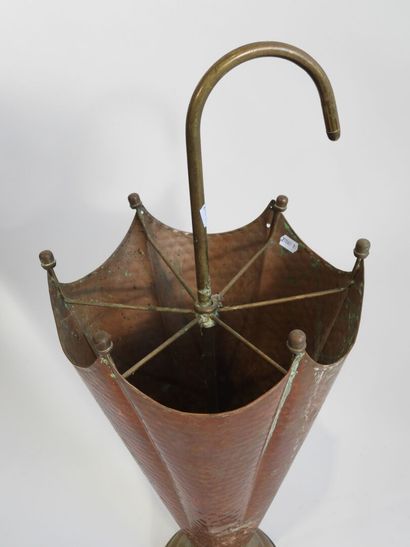 Brass and copper umbrella stand in the shape...