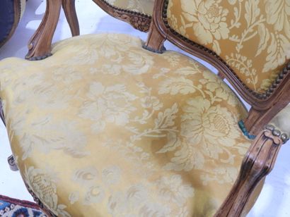 Suite of four molded and carved wood armchairs,...