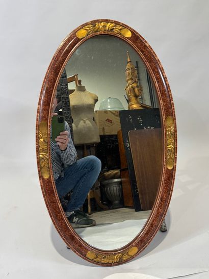 Molded wood mirror with gold highlights and...