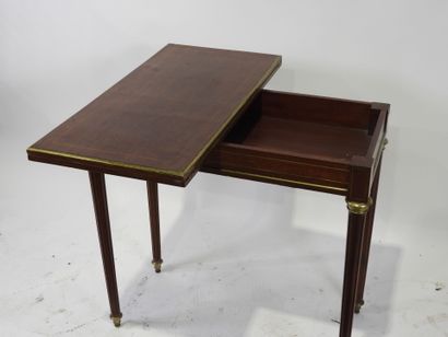 Game table in wood and rosewood veneer, the...