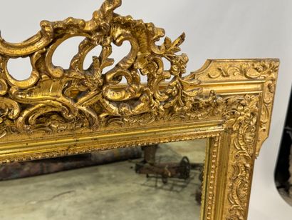 Rectangular wood and stucco mirror with rows...