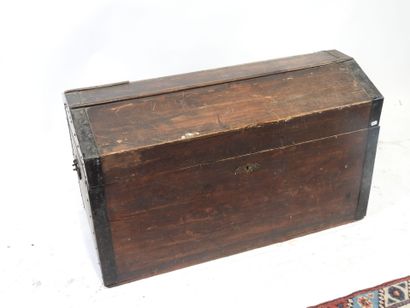 Patinated wood trunk with blackened iron...