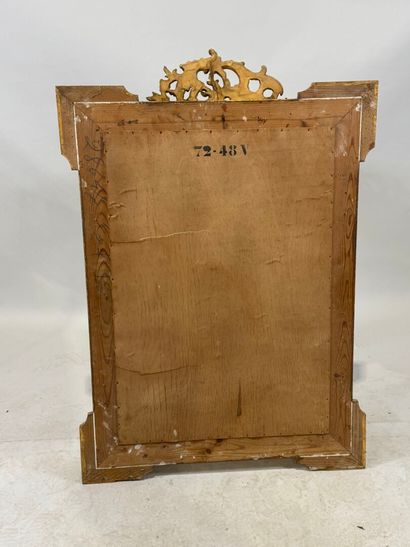 Rectangular wood and stucco mirror with rows...