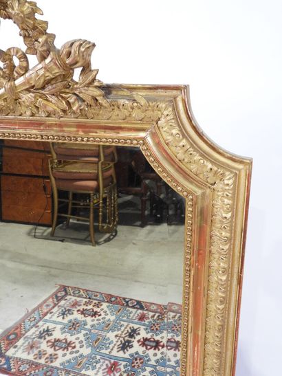Rectangular wood and gilded stucco mirror...