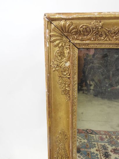 Rectangular wood and gilded stucco mirror...