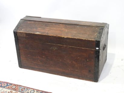 Patinated wood trunk with blackened iron...