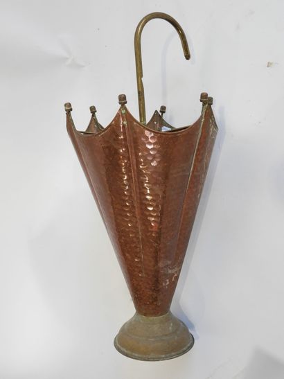 Brass and copper umbrella stand in the shape...