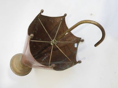 Brass and copper umbrella stand in the shape...