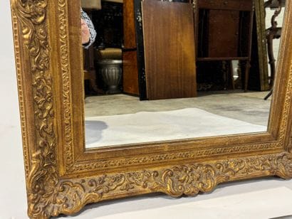 Rectangular gilded and carved wood mirror...