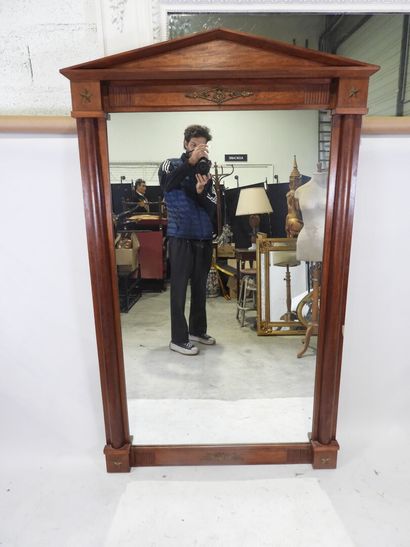 Exotic wood mirror with half-columns topped...