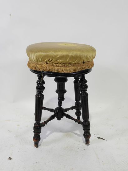 Blackened wood stool, turned, tapered and...