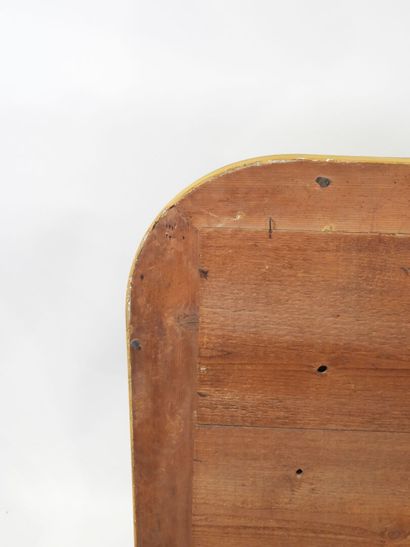 Wood and gilded stucco mirror, with rounded...
